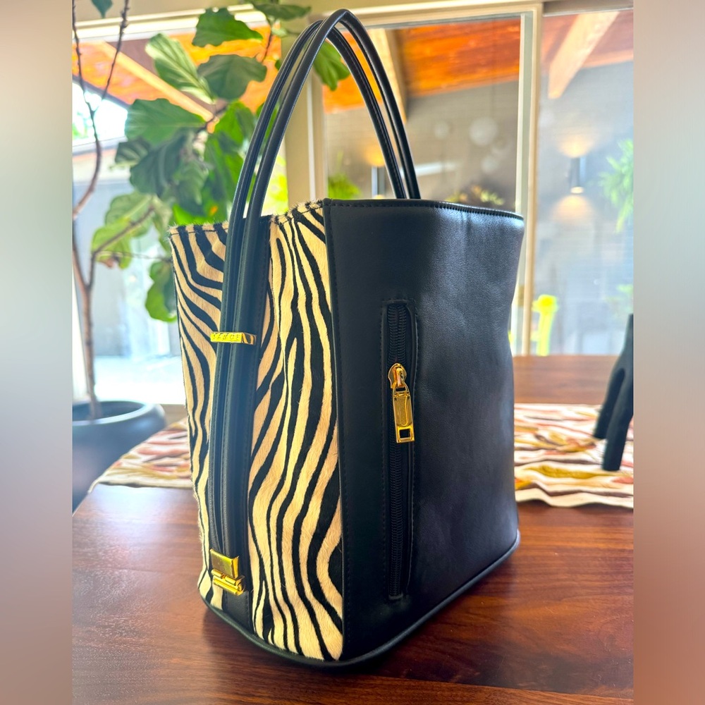 Samoe black leather and hide purse with alternating length strap